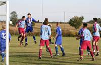 Mills directs his header past the post