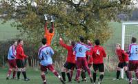 Opposition keeper collects