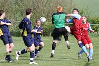 Beccles keeper rushes out