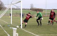 Wymondham defender unable to keep the ball out