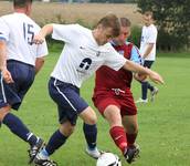 Knott goes in to win the ball