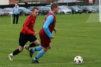 Hempnall player runs with the ball