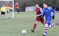 M Barratt chases and wins the ball