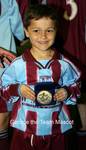 George proudly displays Dad's trophy