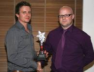 Lee Emmett receiving the Reserves POY and also the