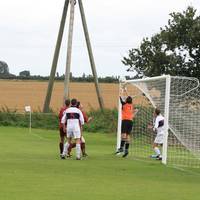 Hempnall pressure sees the goalkeeper needing to p