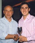 Rob Browne First Team POY receiving his award from