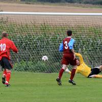 Fine save from Cudden quite late on forces the bal