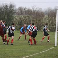 Hempnall forward holds his head as his effort slid