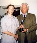 A young Steve Van Raalte receiving his trophy from