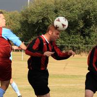 Halliwell competes for the header with the Cromer 